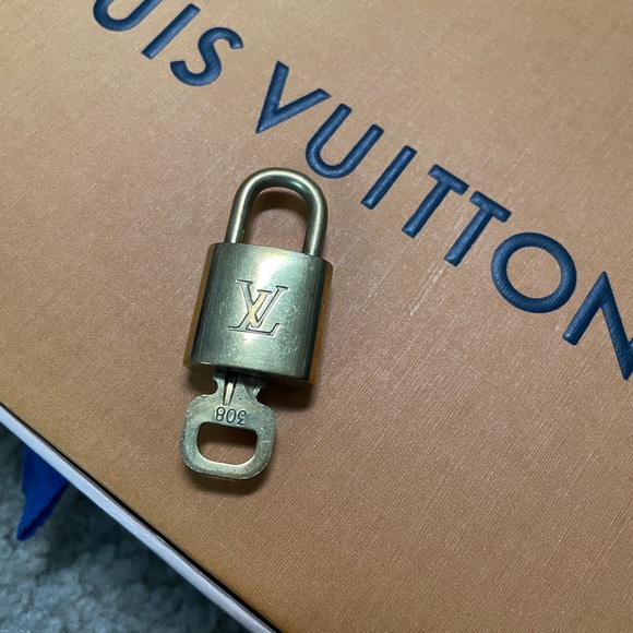 Louis Vuitton Accessories - Louis Vuitton brass padlock